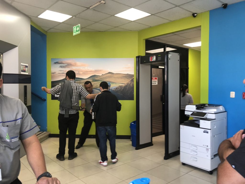 Image of an employee going through security